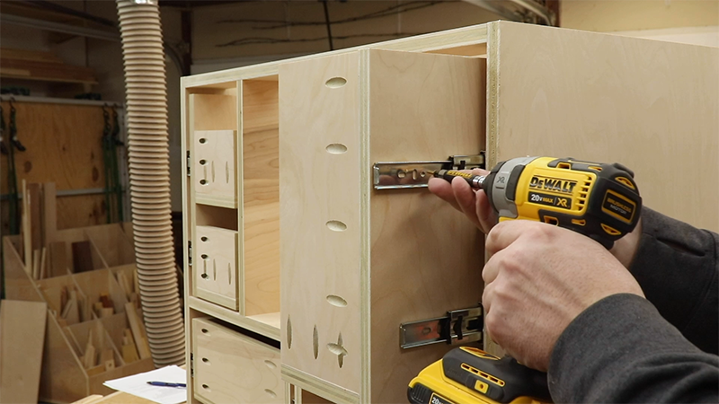Attaching the pull out trays to the drawer slides
