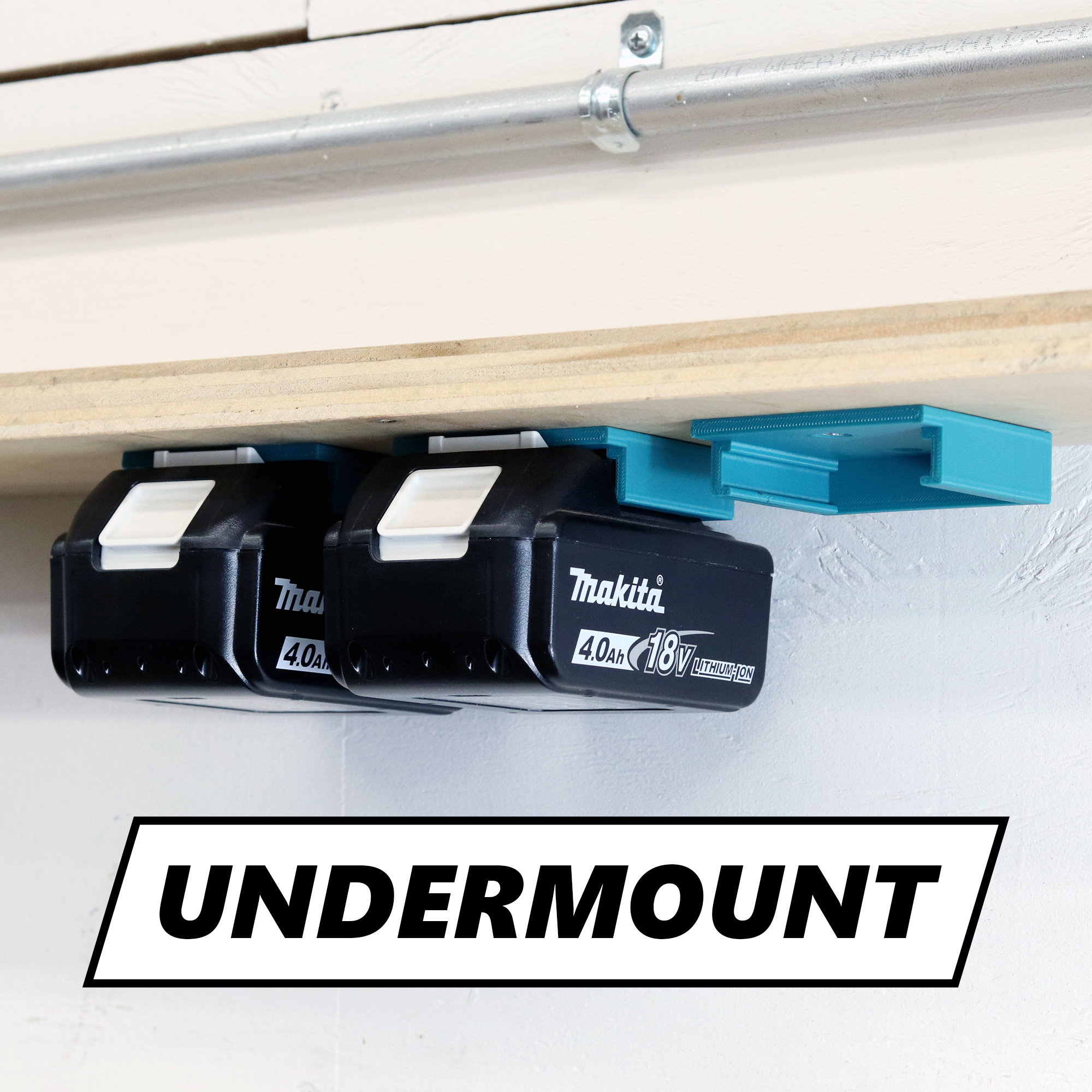 Makita battery holder mounted underneath a shelf