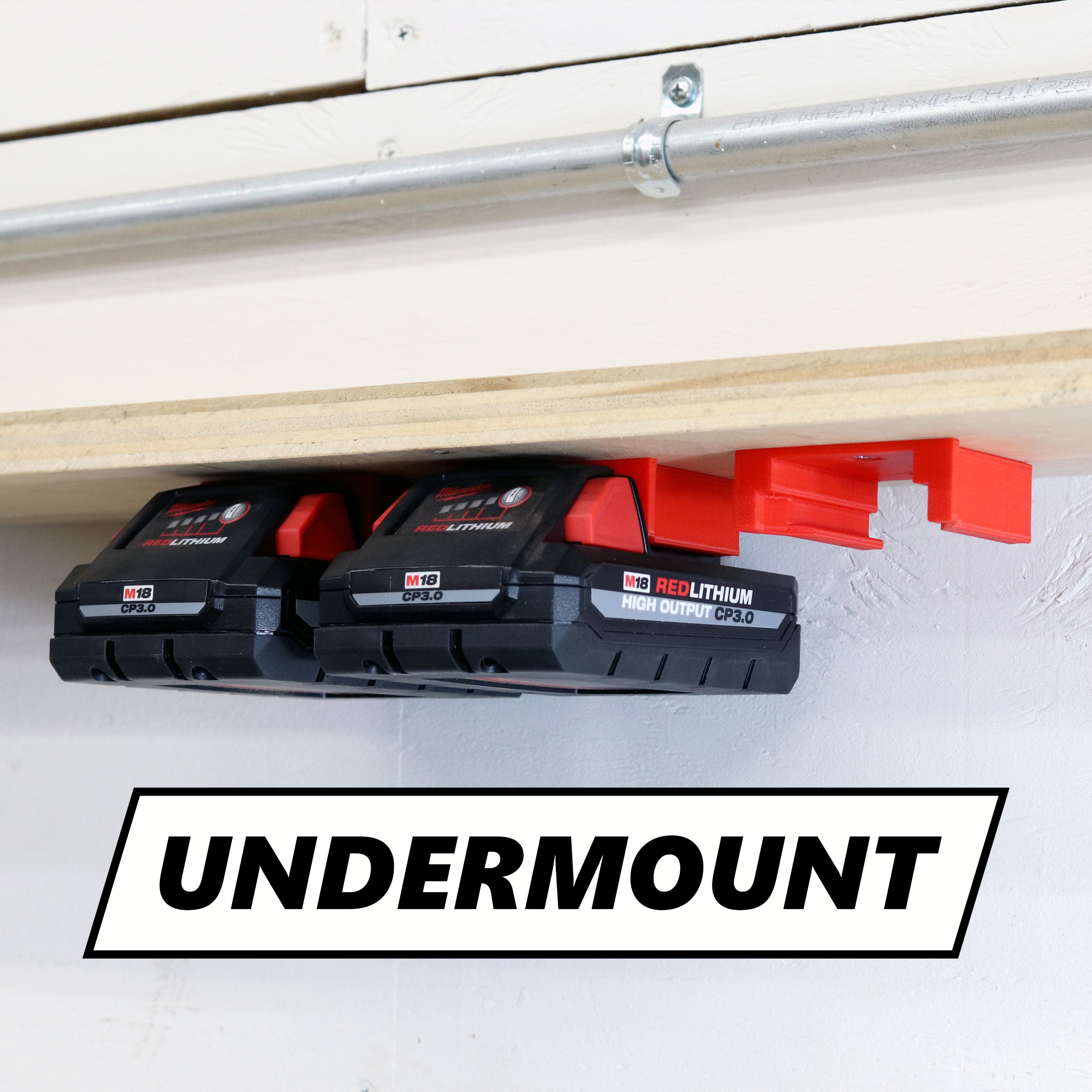 Milwaukee battery holder mounted underneath a shelf