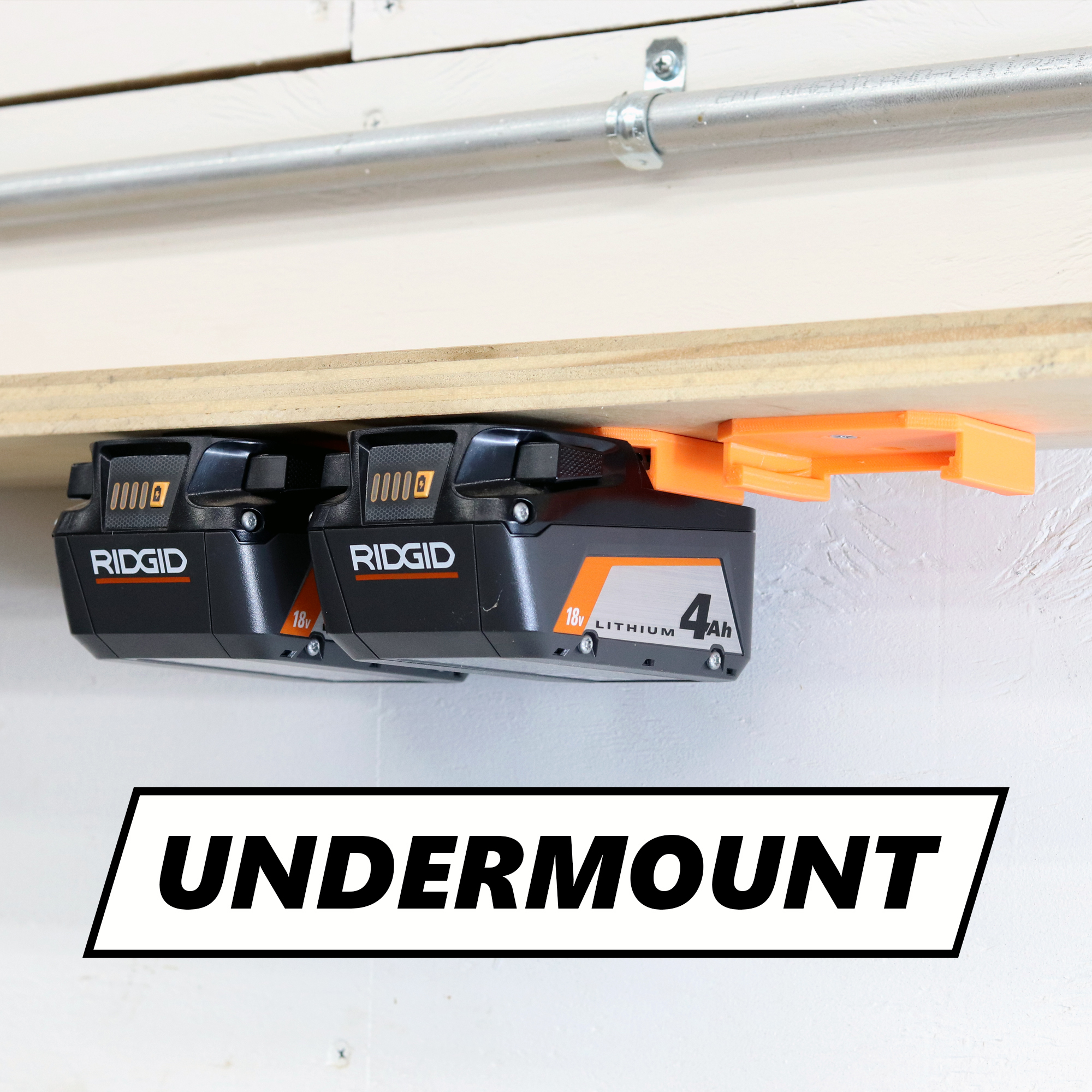 Ridgid battery holder mounted underneath a shelf