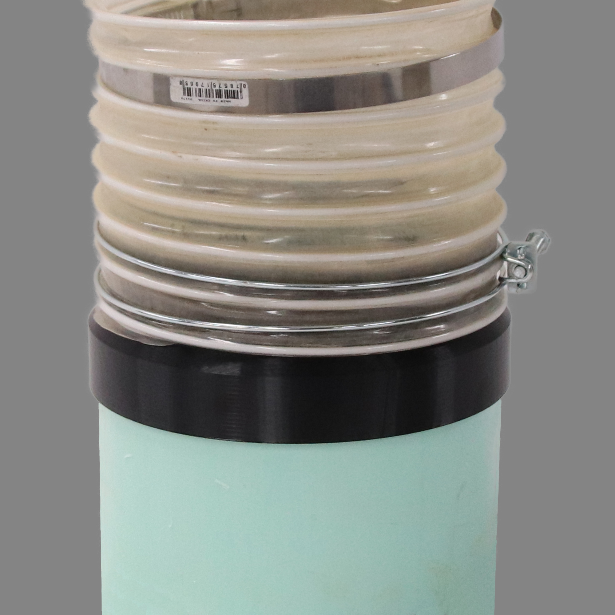 Black PETG dust collection adapter connecting 6 inch SDR35 PVC to 6 inch flex hose, shown installed in a shop dust collection hose line