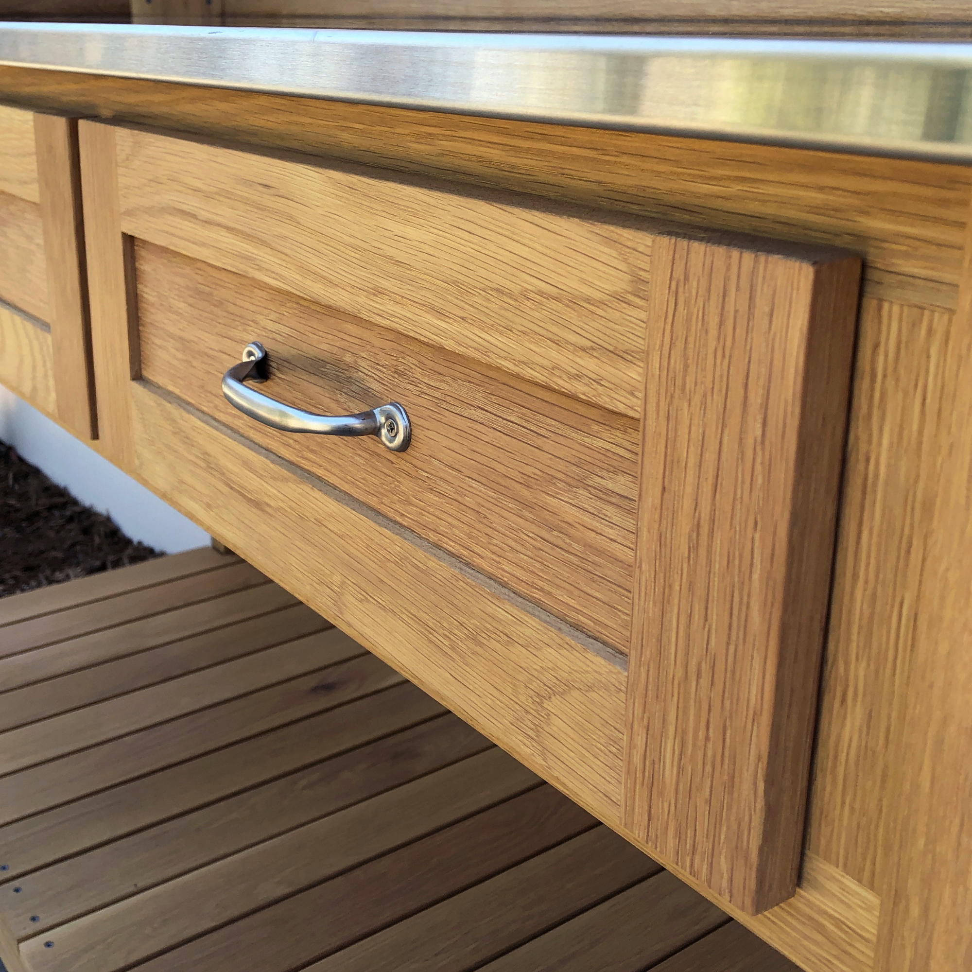 Close-up of a drawer pull on the DIY potting bench