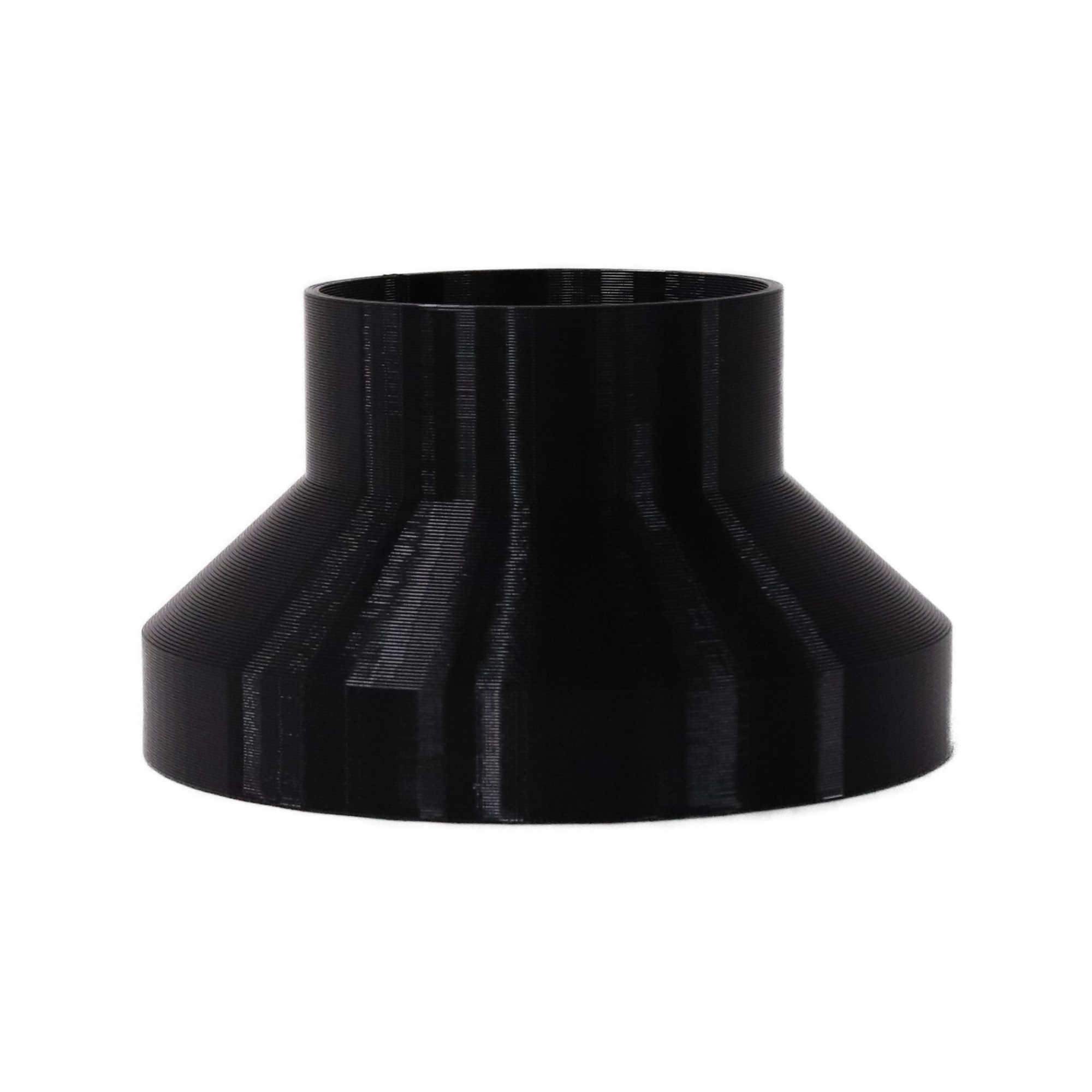Black 3D printed PETG dust collection adapter connecting 6 inch SCH40 PVC to 4 inch flex hose, front product photo